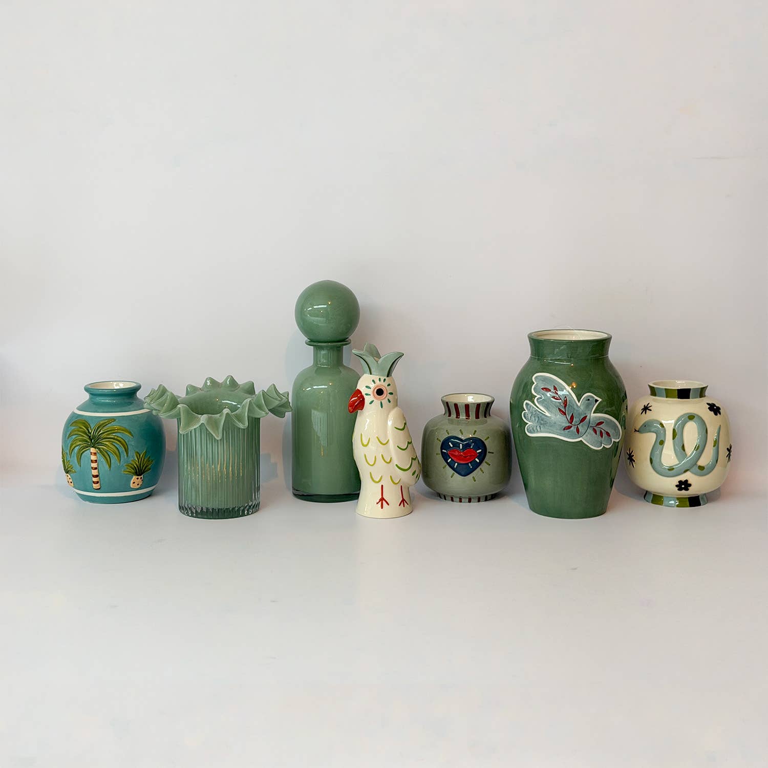 Naive soliflore with green bird motif